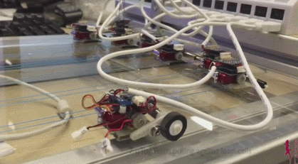 microbots pullilng a car