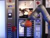 Ford’s Robots Help Workers, Make Coffee