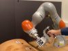 Robot-Assisted Drilling on Curved Surfaces with Haptic Guidance